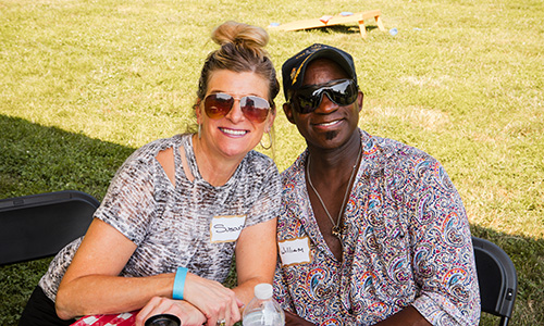 Attendants of the Chicago picnic smiling at the camera
