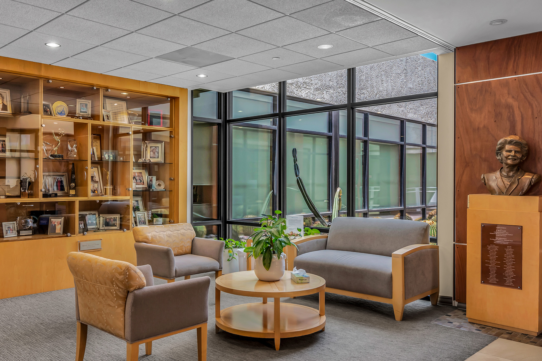 Inside the lobby with comfortable furniture and a large window