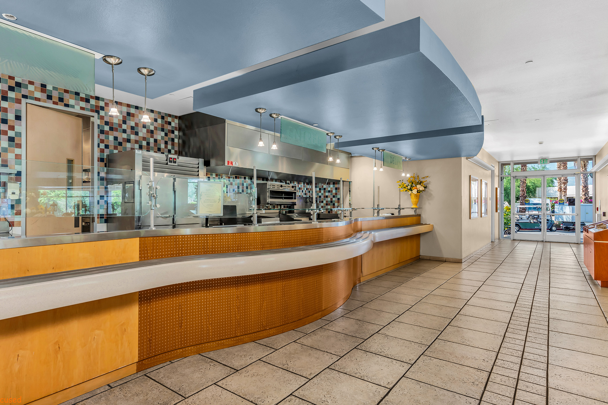 Inside the cafeteria with a colorful backsplash